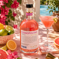Cosmopolitan pronto da bere a Milano, cocktail rosa con vodka Norvik, limone e pompelmo, ideale per aperitivo estivo